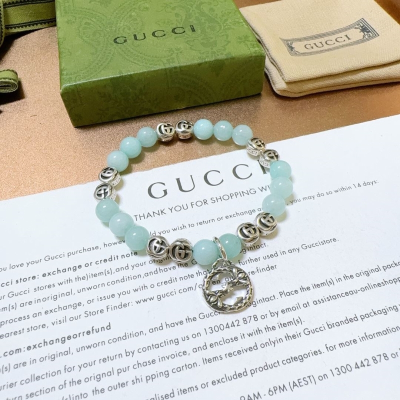 G*u*i bracelets